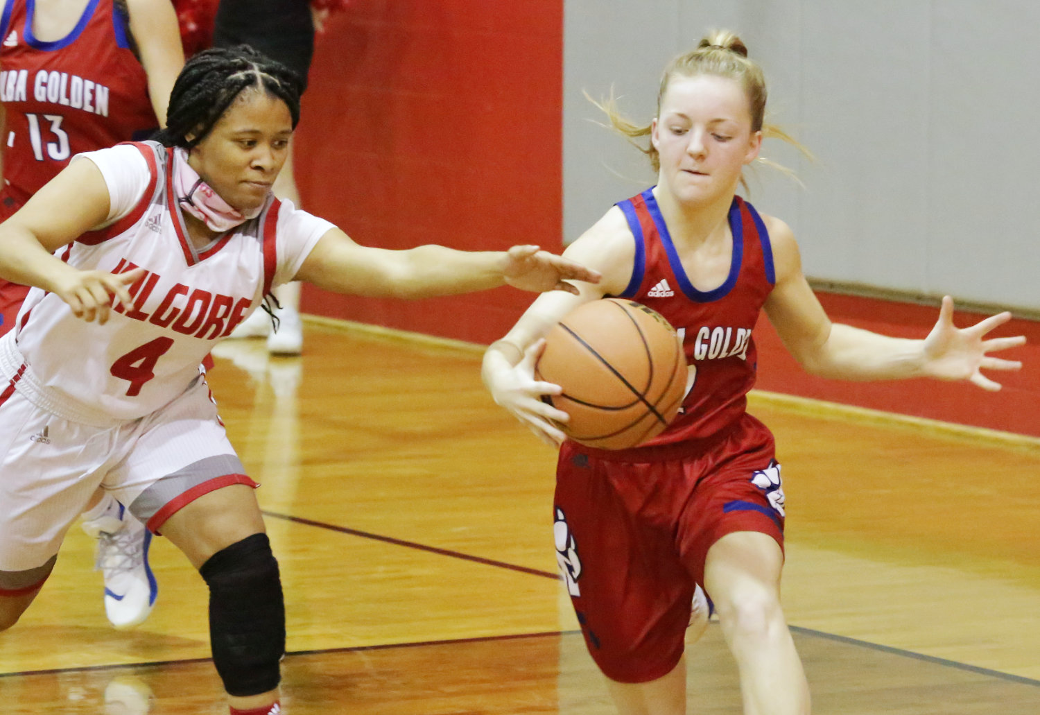 Lady Panther Cacie Lennon scrambles to take a loose ball. She and backcourt teammate Bella Crawford had excellent defensive performances against Kilgore.